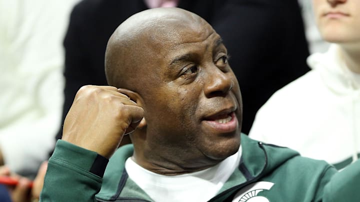 Feb 9, 2019; East Lansing, MI, USA; Michigan State Spartans former player Magic Johnson sits in the stands during the first half of a game between the Michigan State Spartans and the Minnesota Golden Gophers at the Breslin Center. Mandatory Credit: Mike Carter-Imagn Images Feb 9, 2019; East Lansing, MI, USA; Michigan State Spartans former player Magic Johnson sits in the stands during the first half of a game between the Michigan State Spartans and the Minnesota Golden Gophers at the Breslin Center. Mandatory Credit: Mike Carter-Imagn Images