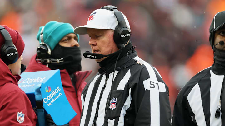 Dec 7, 2025; Cleveland, Ohio, USA; Referee Carl Cheffers (51) watches a video replay monitor during the first quarter of the game between the Tennessee Titans and the Cleveland Browns at Huntington Bank Field. Mandatory Credit: Scott Galvin-Imagn Images Dec 7, 2025; Cleveland, Ohio, USA; Referee Carl Cheffers (51) watches a video replay monitor during the first quarter of the game between the Tennessee Titans and the Cleveland Browns at Huntington Bank Field. Mandatory Credit: Scott Galvin-Imagn Images
