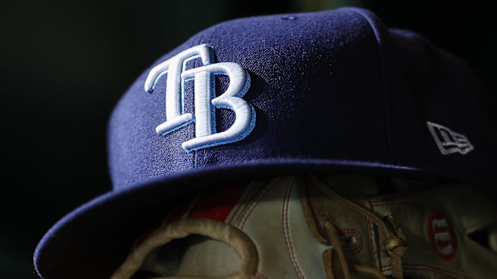 Apr 3, 2023; Washington, District of Columbia, USA; A general view of a Tampa Bay Rays hat and glove during the seventh inning of the game against the Washington Nationals at Nationals Park. Apr 3, 2023; Washington, District of Columbia, USA; A general view of a Tampa Bay Rays hat and glove during the seventh inning of the game against the Washington Nationals at Nationals Park.