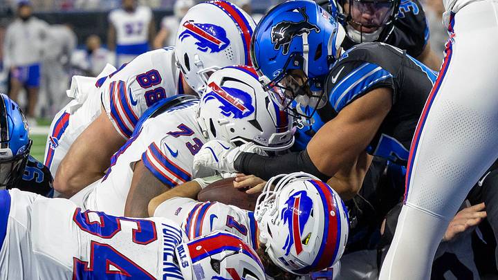 Dec 15, 2024; Detroit, Michigan, USA; Buffalo Bills quarterback Josh Allen (17) scores a touchdown against the Detroit Lions during the first quarter at Ford Field. Mandatory Credit: David Reginek-Imagn Images