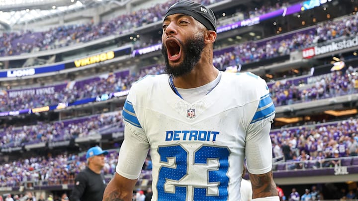 Former Detroit Lions cornerback Carlton Davis III (23) celebrates his team's win after the game against the Minnesota Vikings at U.S. Bank Stadium.