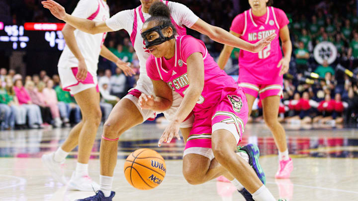 NC State guard Zamareya Jones, front, drives to the basket against Notre Dame guard Hannah Hidalgo during an NCAA women's basketball game at Purcell Pavilion on Sunday, Feb. 15, 2026, in South Bend. NC State guard Zamareya Jones, front, drives to the basket against Notre Dame guard Hannah Hidalgo during an NCAA women's basketball game at Purcell Pavilion on Sunday, Feb. 15, 2026, in South Bend.