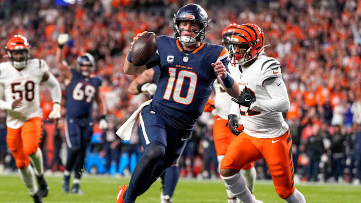Denver Broncos quarterback Bo Nix (10) runs into the end zone for a touchdown in the first quarter of the NFL Week 4 Monday Night Football game between the Denver Broncos and the Cincinnati Bengals at Empower Field at Mile High in Denver on Monday, Sept. 29, 2025.