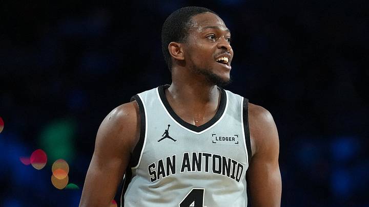 Dec 16, 2025; Las Vegas, Nevada, USA; San Antonio Spurs guard De'Aaron Fox (4) reacts against the New York Knicks during the Emirates NBA Cup Final at T-Mobile Arena. Mandatory Credit: Kirby Lee-Imagn Images
