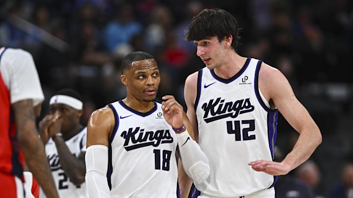 Mar 14, 2026; Inglewood, California, USA; Sacramento Kings center Maxime Raynaud (42) talks to guard Russell Westbrook (18) against the LA Clippers during the first quarter at Intuit Dome.