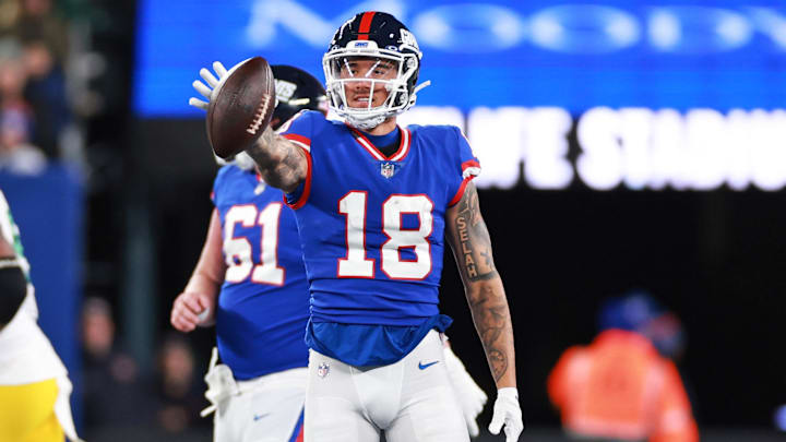 Dec 11, 2023; East Rutherford, New Jersey, USA; New York Giants wide receiver Isaiah Hodgins (18) reacts during the second quarter against the Green Bay Packers at MetLife Stadium. Mandatory Credit: Vincent Carchietta-Imagn Images Dec 11, 2023; East Rutherford, New Jersey, USA; New York Giants wide receiver Isaiah Hodgins (18) reacts during the second quarter against the Green Bay Packers at MetLife Stadium. Mandatory Credit: Vincent Carchietta-Imagn Images