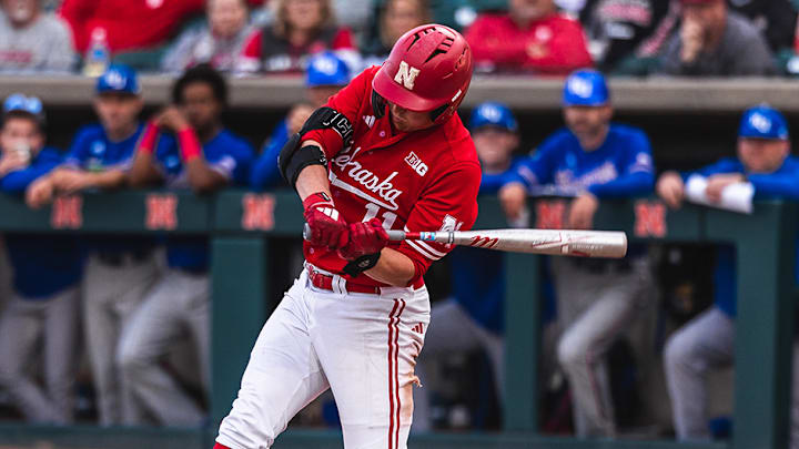 Nebraska right fielder Max Buettenback swings at a pitch against Kansas at Haymarket Park on April 23, 2025. Nebraska right fielder Max Buettenback swings at a pitch against Kansas at Haymarket Park on April 23, 2025.