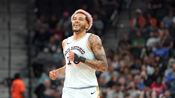 Mar 21, 2025; San Antonio, Texas, USA; San Antonio Spurs forward Jeremy Sochan (10) reacts during the fourth quarter against the Philadelphia 76ers at Frost Bank Center.