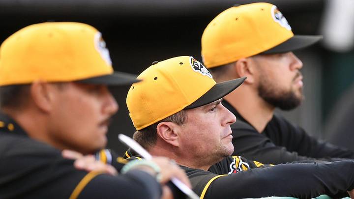 Erie SeaWolves manager Gabe Alvarez, center, works during a game against the Akron RubberDucks at UPMC Park in Erie on Sept. 20, 2024.