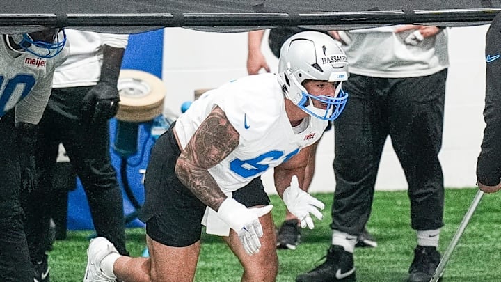 Detroit Lions defensive end Ahmed Hassanein (61) practices during OTA at Performance Center in Allen Park