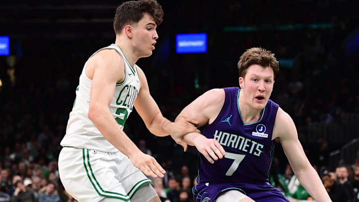 Mar 4, 2026; Boston, Massachusetts, USA; Charlotte Hornets guard Kon Knueppel (7) controls the ball while Boston Celtics guard Hugo Gonzalez (28) defends during the second half at TD Garden. Mandatory Credit: Bob DeChiara-Imagn Images Mar 4, 2026; Boston, Massachusetts, USA; Charlotte Hornets guard Kon Knueppel (7) controls the ball while Boston Celtics guard Hugo Gonzalez (28) defends during the second half at TD Garden. Mandatory Credit: Bob DeChiara-Imagn Images