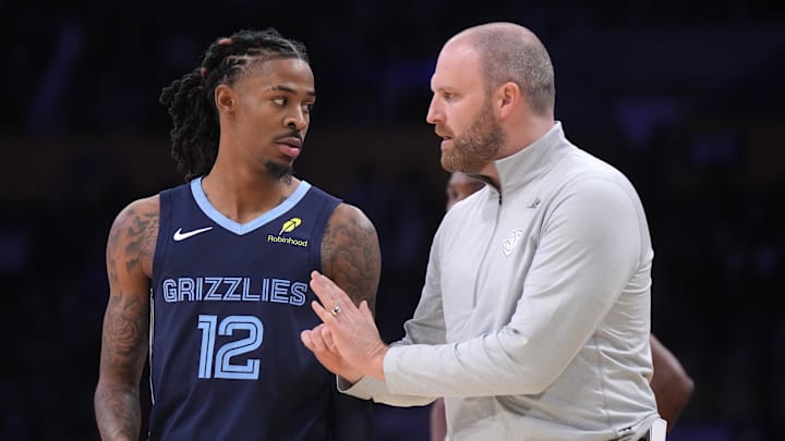 Dec 15, 2024; Los Angeles, California, USA; Memphis Grizzlies coach Taylor Jenkins (right) talks with guard Ja Morant (12) against the Los Angeles Lakers at Crypto.com Arena. Mandatory Credit: Kirby Lee-Imagn Images