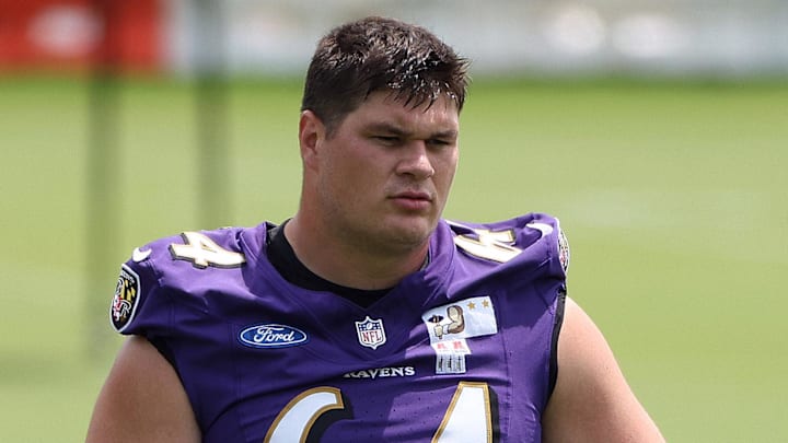 Jun 10, 2025; Baltimore, MD, USA; Baltimore Ravens center Tyler Linderbaum (64) looks on during an NFL OTA at Under Armour Performance Center. Mandatory Credit: Daniel Kucin Jr.-Imagn Images