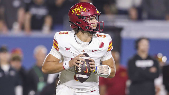 Oct 12, 2024; Morgantown, West Virginia, USA; Iowa State Cyclones quarterback Rocco Becht (3) drops back to pass against the West Virginia Mountaineers during the third quarter at Mountaineer Field at Milan Puskar Stadium. Mandatory Credit: Ben Queen-Imagn Images