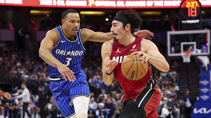 Dec 5, 2025; Orlando, Florida, USA; Miami Heat forward Jaime Jaquez Jr. (11) drives to the basket past Orlando Magic guard Desmond Bane (3) in the first quarter at Kia Center. Mandatory Credit: Nathan Ray Seebeck-Imagn Images Dec 5, 2025; Orlando, Florida, USA; Miami Heat forward Jaime Jaquez Jr. (11) drives to the basket past Orlando Magic guard Desmond Bane (3) in the first quarter at Kia Center. Mandatory Credit: Nathan Ray Seebeck-Imagn Images