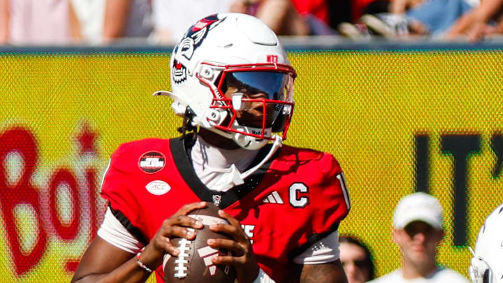 Oct 4, 2025; Raleigh, North Carolina, USA;  NC State Wolfpack quarterback CJ Bailey (11) prepares to throw the ball during the first half of the game against Campbell Fighting Camels at Carter-Finley Stadium. Mandatory Credit: Jaylynn Nash-Imagn Images