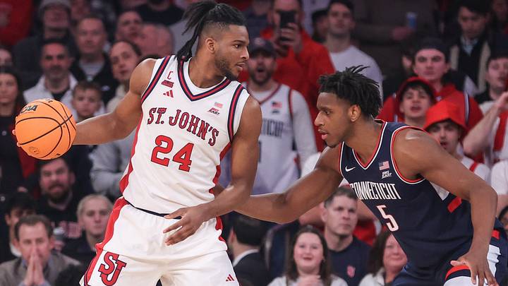 Feb 6, 2026; New York, New York, USA; St. John's Red Storm forward Zuby Ejiofor (24) looks to drive past UConn Huskies forward Tarris Reed Jr. (5) in the first half at Madison Square Garden. Mandatory Credit: Wendell Cruz-Imagn Images Feb 6, 2026; New York, New York, USA; St. John's Red Storm forward Zuby Ejiofor (24) looks to drive past UConn Huskies forward Tarris Reed Jr. (5) in the first half at Madison Square Garden. Mandatory Credit: Wendell Cruz-Imagn Images
