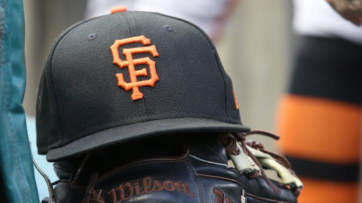 Jul 14, 2023; Pittsburgh, Pennsylvania, USA; San Francisco Giants hat and glove on the bench against the Pittsburgh Pirates during the first inning at PNC Park. Jul 14, 2023; Pittsburgh, Pennsylvania, USA; San Francisco Giants hat and glove on the bench against the Pittsburgh Pirates during the first inning at PNC Park.