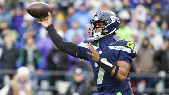 Dec 22, 2024; Seattle, Washington, USA; Seattle Seahawks quarterback Geno Smith (7) passes against the Minnesota Vikings during the second quarter at Lumen Field. Mandatory Credit: Joe Nicholson-Imagn Images