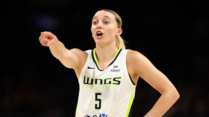 Jun 11, 2025; Phoenix, Arizona, USA; Dallas Wings guard Paige Bueckers (5) reacts against the Phoenix Mercury in the first half at PHX Arena. Mandatory Credit: Mark J. Rebilas-Imagn Images