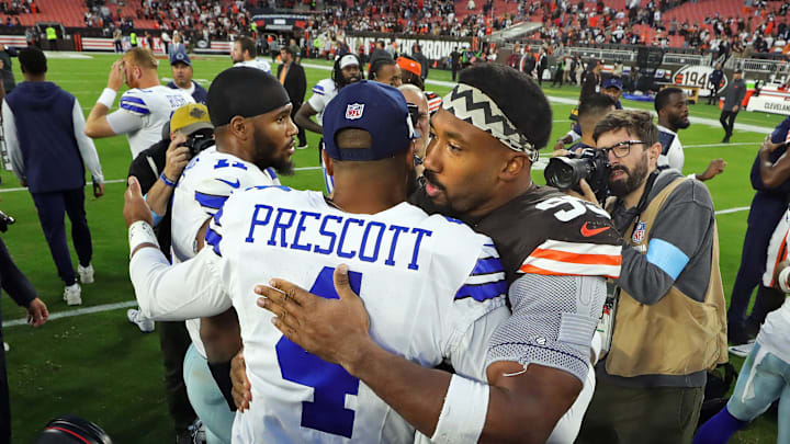 Cleveland Browns defensive end Myles Garrett, facing, hugs Dallas Cowboys quarterback Dak Prescott and linebacker Micah Parsons after losing to the Cowboys in an NFL football game at Huntington Bank Field, Sunday, Sept. 8, 2024, in Cleveland, Ohio. Cleveland Browns defensive end Myles Garrett, facing, hugs Dallas Cowboys quarterback Dak Prescott and linebacker Micah Parsons after losing to the Cowboys in an NFL football game at Huntington Bank Field, Sunday, Sept. 8, 2024, in Cleveland, Ohio.