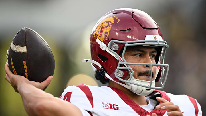 Sep 13, 2025; West Lafayette, Indiana, USA; Southern California Trojans quarterback Jayden Maiava (14) warms up on the sidelines during the first quarter against the Purdue Boilermakers at Ross-Ade Stadium. Mandatory Credit: Marc Lebryk-Imagn Images Sep 13, 2025; West Lafayette, Indiana, USA; Southern California Trojans quarterback Jayden Maiava (14) warms up on the sidelines during the first quarter against the Purdue Boilermakers at Ross-Ade Stadium. Mandatory Credit: Marc Lebryk-Imagn Images
