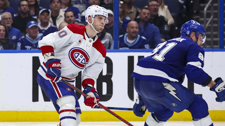 Apr 19, 2026; Tampa, Florida, USA; Montreal Canadiens forward Juraj Slafkovsky (20) scores the winning goal against the Tampa Bay Lightning during extra time in game one of the first round of the 2026 Stanley Cup Playoffs at Benchmark International Arena. Mandatory Credit: Morgan Tencza-Imagn Images