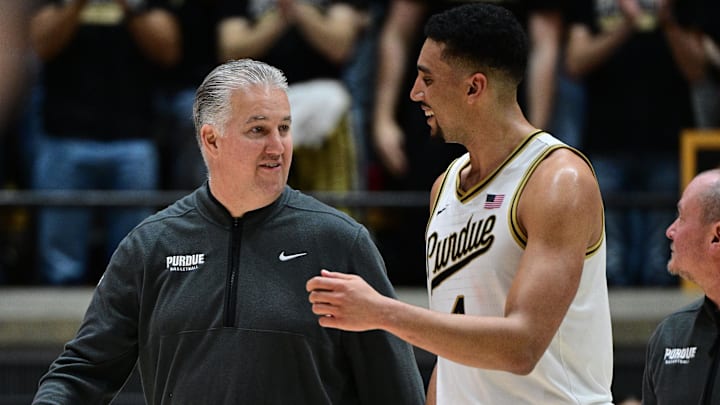 Purdue coach Matt Painter and forward Trey Kaufman-Renn (4) against USC at Mackey Arena. 