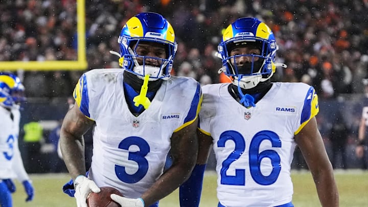 Jan 18, 2026; Chicago, IL, USA; Los Angeles Rams safety Kam Curl (3) celebrates with safety Kamren Kinchens (26) after intercepting a pass intended for Chicago Bears wide receiver DJ Moore (not pictured) during overtime of an NFC Divisional Round game at Soldier Field. Mandatory Credit: David Banks-Imagn Images