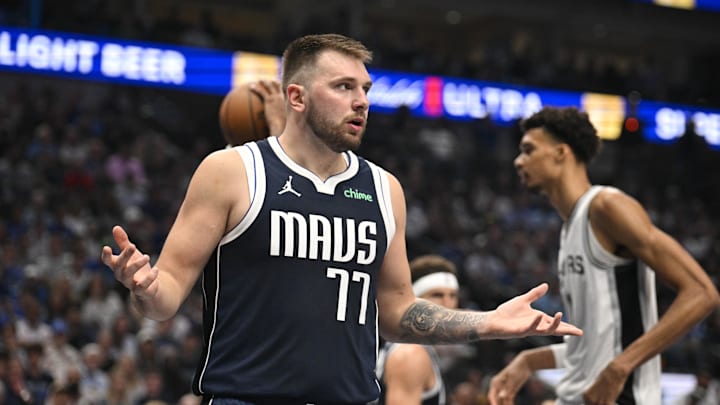 Oct 24, 2024; Dallas, Texas, USA; Dallas Mavericks guard Luka Doncic (77) reacts to a foul call during the second quarter against the San Antonio Spurs at the American Airlines Center. Mandatory Credit: Jerome Miron-Imagn Images