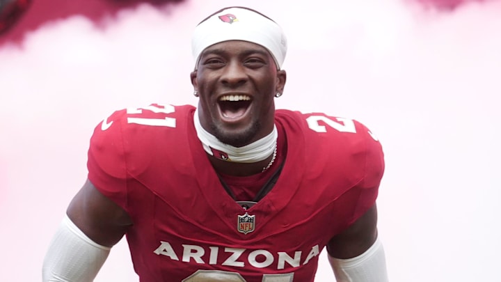 Arizona Cardinals cornerback Garrett Williams (21) is introduced before their game against the Carolina Panthers at State Farm Stadium on Sept 14, 2025. Arizona Cardinals cornerback Garrett Williams (21) is introduced before their game against the Carolina Panthers at State Farm Stadium on Sept 14, 2025.