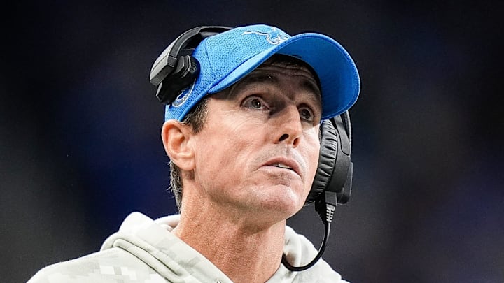 Detroit Lions special teams coordinator Dave Fipp watches a replay against Jacksonville Jaguars 