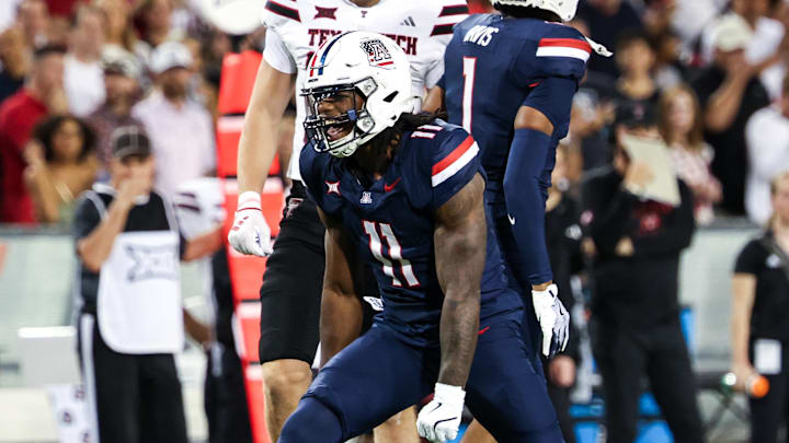 Oct 5, 2024; Tucson, Arizona, USA; Arizona Wildcats defensive lineman Chase Kennedy (11) celebrates tackle against Texas Tech Red Raiders during first quarter at Arizona Stadium. Mandatory Credit: Aryanna Frank-Imagn Images Oct 5, 2024; Tucson, Arizona, USA; Arizona Wildcats defensive lineman Chase Kennedy (11) celebrates tackle against Texas Tech Red Raiders during first quarter at Arizona Stadium. Mandatory Credit: Aryanna Frank-Imagn Images