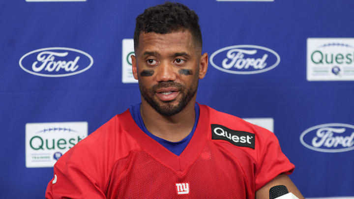Jul 23, 2025; East Rutherford, NJ, USA; New York Giants quarterback Russell Wilson (3) talks with media during training camp at Quest Diagnostics Training Center. Mandatory Credit: Vincent Carchietta-Imagn Images