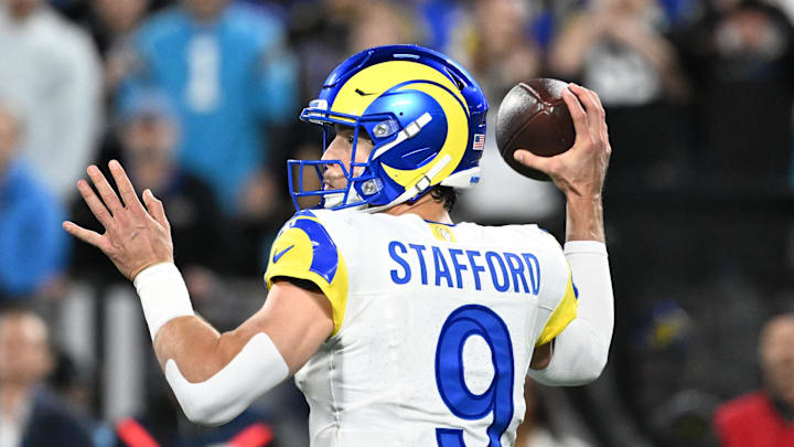 Jan 10, 2026; Charlotte, NC, USA; Los Angeles Rams quarterback Matthew Stafford (9) passes the ball in the fourth quarter in an NFC Wild Card Round game at Bank of America Stadium. Mandatory Credit: Bob Donnan-Imagn Images