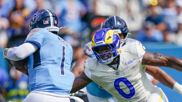 Tennessee Titans quarterback Cam Ward (1) is sacked by Los Angeles Rams linebacker Byron Young (0) during the first quarter at Niss Tennessee Titans quarterback Cam Ward (1) is sacked by Los Angeles Rams linebacker Byron Young (0) during the first quarter at Niss