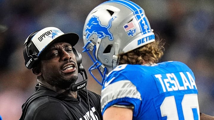 Detroit Lions assistant head coach and wide receivers coach Scottie Montgomery talks to wideout Isaac TeSlaa Detroit Lions assistant head coach and wide receivers coach Scottie Montgomery talks to wideout Isaac TeSlaa