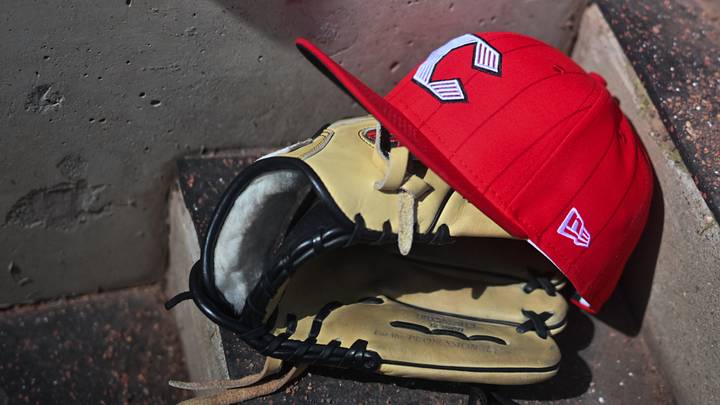 Apr 11, 2026; Cincinnati, Ohio, USA; A view of an official Cincinnati Reds hat on the dugout steps during the game against the Los Angeles Angels at Great American Ball Park. Mandatory Credit: Aaron Doster-Imagn Images Apr 11, 2026; Cincinnati, Ohio, USA; A view of an official Cincinnati Reds hat on the dugout steps during the game against the Los Angeles Angels at Great American Ball Park. Mandatory Credit: Aaron Doster-Imagn Images