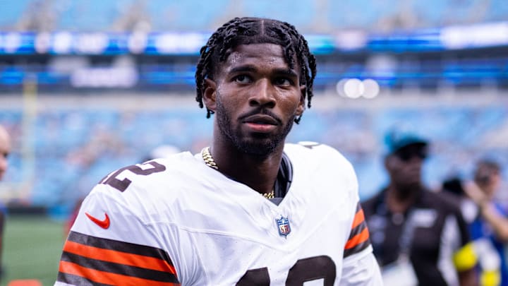 Aug 8, 2025; Charlotte, North Carolina, USA; August 8, 2025: Cleveland Browns quarterback Shedeur Sanders (12) walks off before the game against the Carolina Panthers at Bank of America Stadium. Mandatory Credit: Scott Kinser-The USAToday Network via Imagn Images 