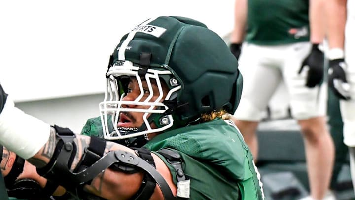 Michigan State's Ben Roberts runs a drill during spring football practice on Tuesday, April 14, 2026, in East Lansing.