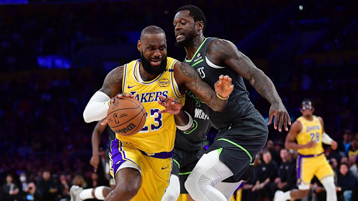 Apr 30, 2025; Los Angeles, California, USA; Los Angeles Lakers forward LeBron James (23) moves to the basket against Minnesota Timberwolves forward Julius Randle (30) during the first half in game five of first round for the 2025 NBA Playoffs at Crypto.com Arena.