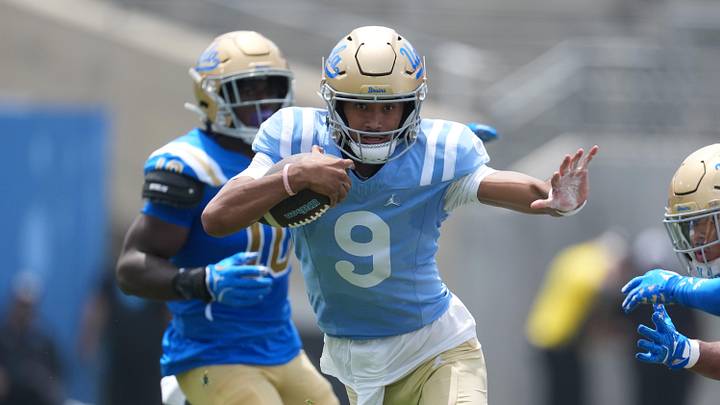 May 2, 2026; Pasadena, CA, USA; UCLA Bruins quarterback Nico Iamaleava (9) carries the ball during the spring game at Rose Bowl. Mandatory Credit: Kirby Lee-Imagn Images
