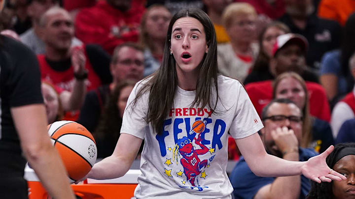 Indiana Fever guard Caitlin Clark (22) reacts to a call from the referee Tuesday, Aug. 12, 2025, during the game at Gainbridge Fieldhouse in Indianapolis. The Dallas Wings defeated the Indiana Fever, 81-80.