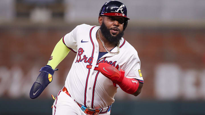 Atlanta Braves designated hitter Marcell Ozuna (20) runs to third against the Washington Nationals in the sixth inning at Truist Park.