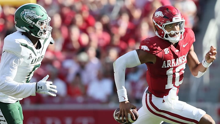 Arkansas Razorbacks quarterback Taylen Green (10) escapes a UAB defender during the Hogs' 37-27 victory at Razorback Stadium in the season's third game. Green, a transfer from Boise State, hopes to lead Arkansas to its second SEC road win today at Starkville, Miss. Arkansas Razorbacks quarterback Taylen Green (10) escapes a UAB defender during the Hogs' 37-27 victory at Razorback Stadium in the season's third game. Green, a transfer from Boise State, hopes to lead Arkansas to its second SEC road win today at Starkville, Miss.