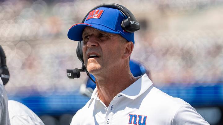 New York Giants head coach John Harbaugh watches from the sidelines during a preseason opening game New York Giants head coach John Harbaugh watches from the sidelines during a preseason opening game