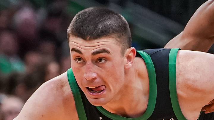 Apr 28, 2026; Boston, Massachusetts, USA; Boston Celtics guard Payton Pritchard (11) drives the ball against Philadelphia 76ers guard Quentin Grimes (5) in the second half during game five of the first round of the 2026 NBA Playoffs at TD Garden. Mandatory Credit: David Butler II-Imagn Images