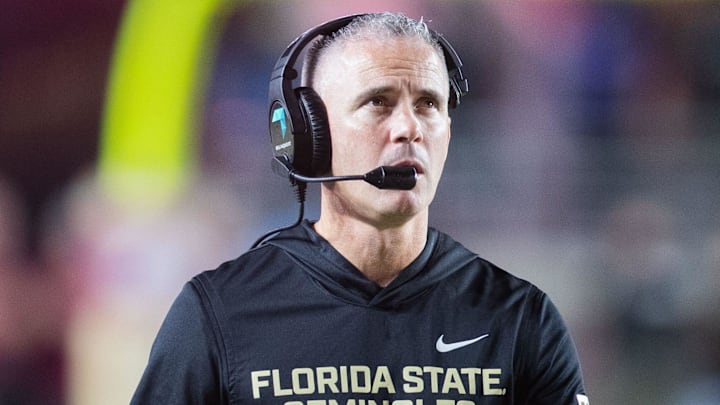 Florida State Seminoles head coach Mike Norvell walks down the field. The Miami Hurricanes lead the Florida State Seminoles 14-3 at the half on Saturday, Oct. 4, 2025.