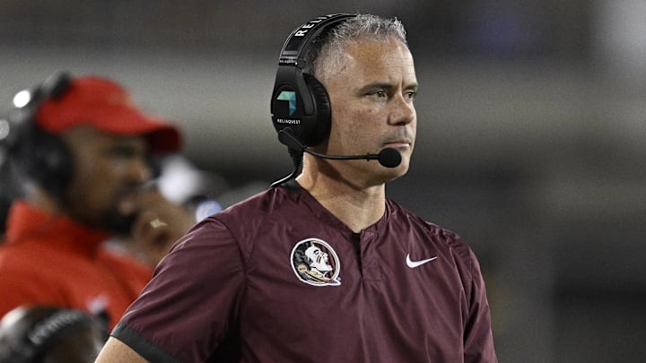 Sep 28, 2024; Dallas, Texas, USA; Florida State Seminoles head coach Mike Norvell during the game between the Southern Methodist Mustangs and the Florida State Seminoles at Gerald J. Ford Stadium. Mandatory Credit: Jerome Miron-Imagn Images Sep 28, 2024; Dallas, Texas, USA; Florida State Seminoles head coach Mike Norvell during the game between the Southern Methodist Mustangs and the Florida State Seminoles at Gerald J. Ford Stadium. Mandatory Credit: Jerome Miron-Imagn Images