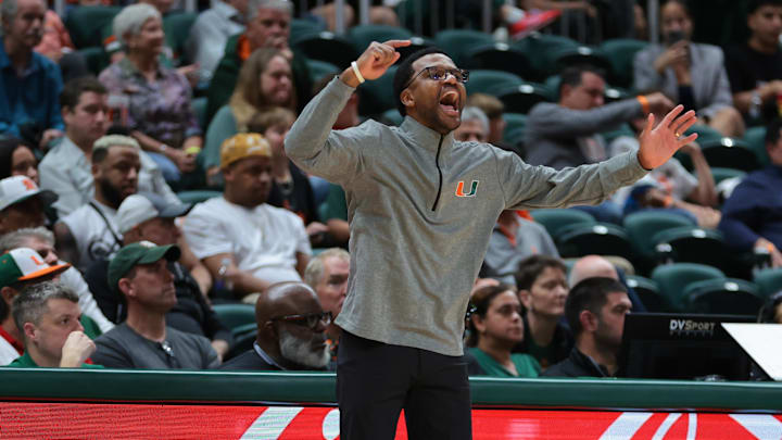 Nov 3, 2025; Coral Gables, Florida, USA; Miami Hurricanes head coach Jai Lucas reacts against the Jacksonville Dolphins during the second half at Watsco Center. Mandatory Credit: Sam Navarro-Imagn Images
